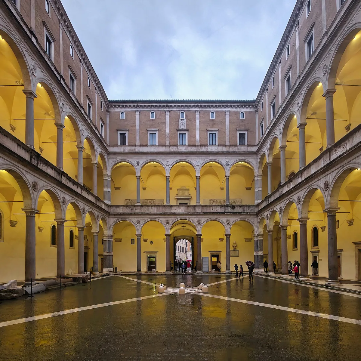 The Renaissance courtyard of the Palazzo della Cancelleria at dusk, opera concert rome